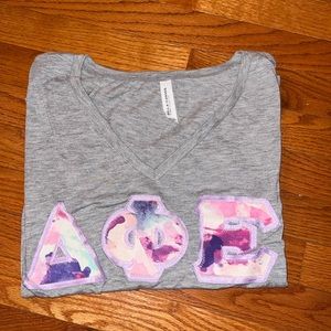 Delta Phi Epsilon Marble Letters Tee